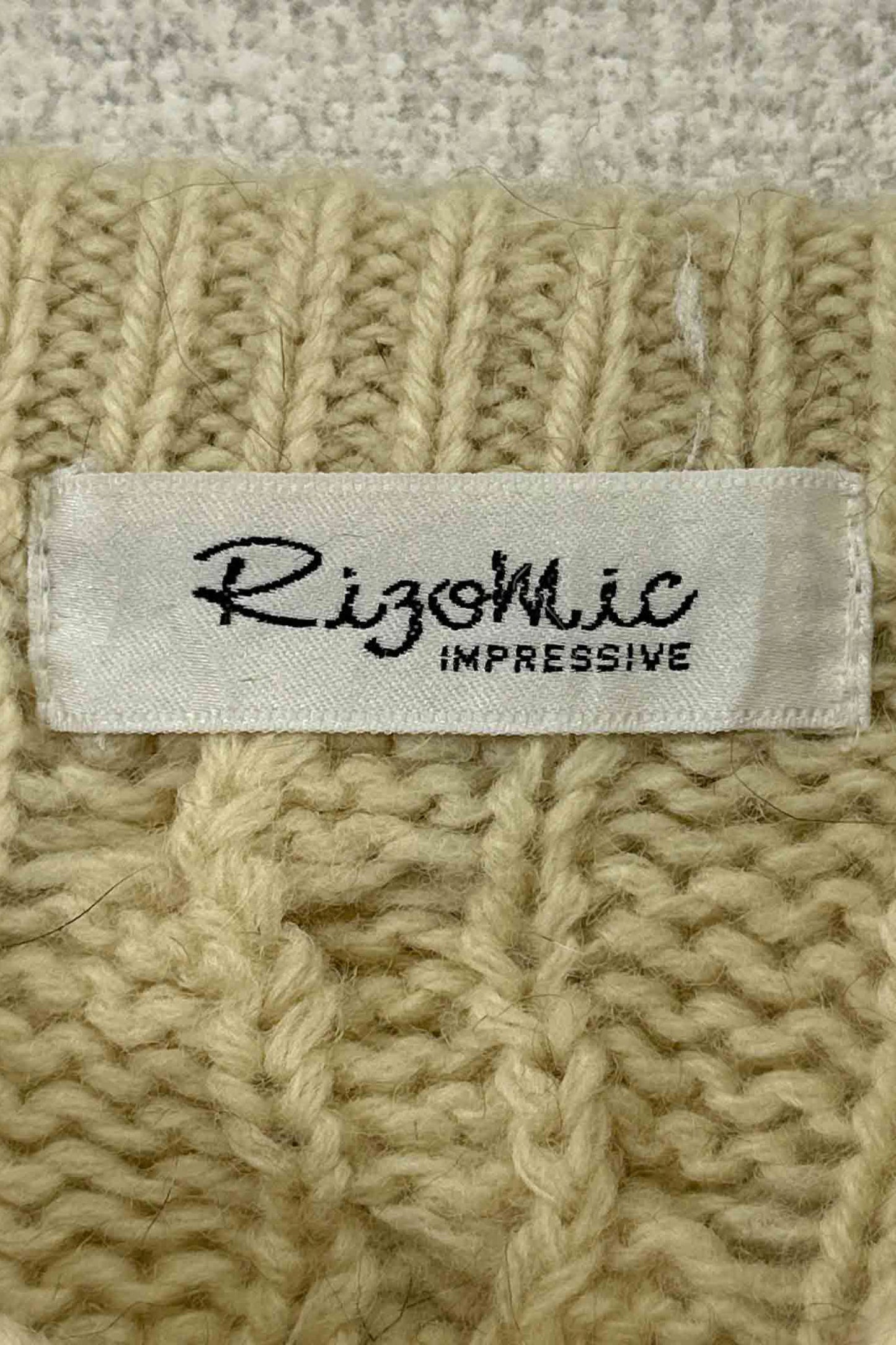 Rigomic white wool sweater